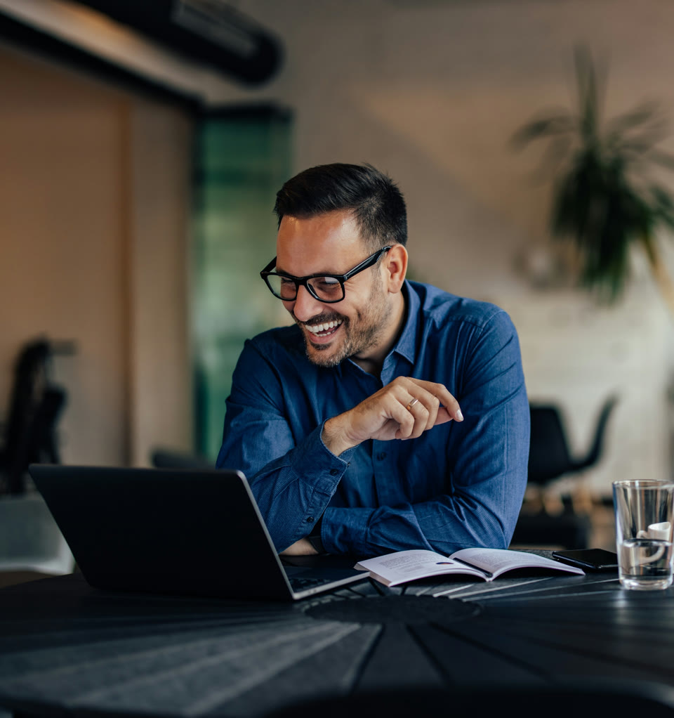 Founder at a laptop